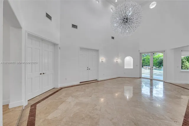 a kitchen with stainless steel appliances granite countertop a stove and a sink