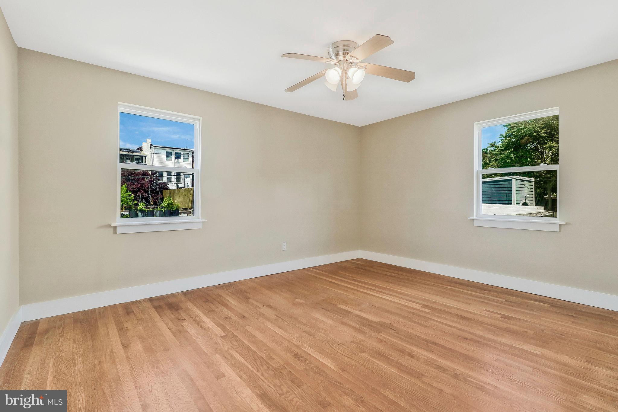 907 Euclid Street Northwest, Unit 203 Washington, DC 20001 - Photo 18 of 22 a view of an empty room with a window