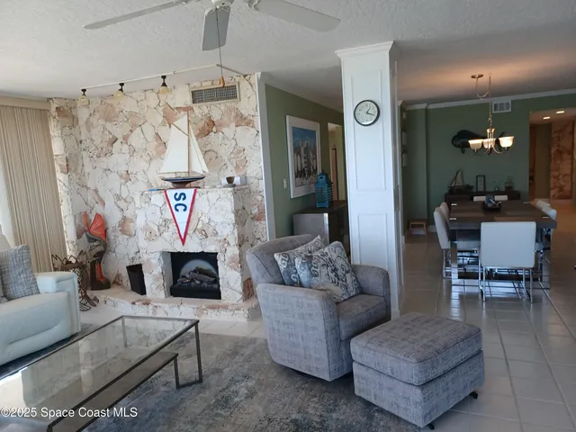 a dining room with a table and chairs