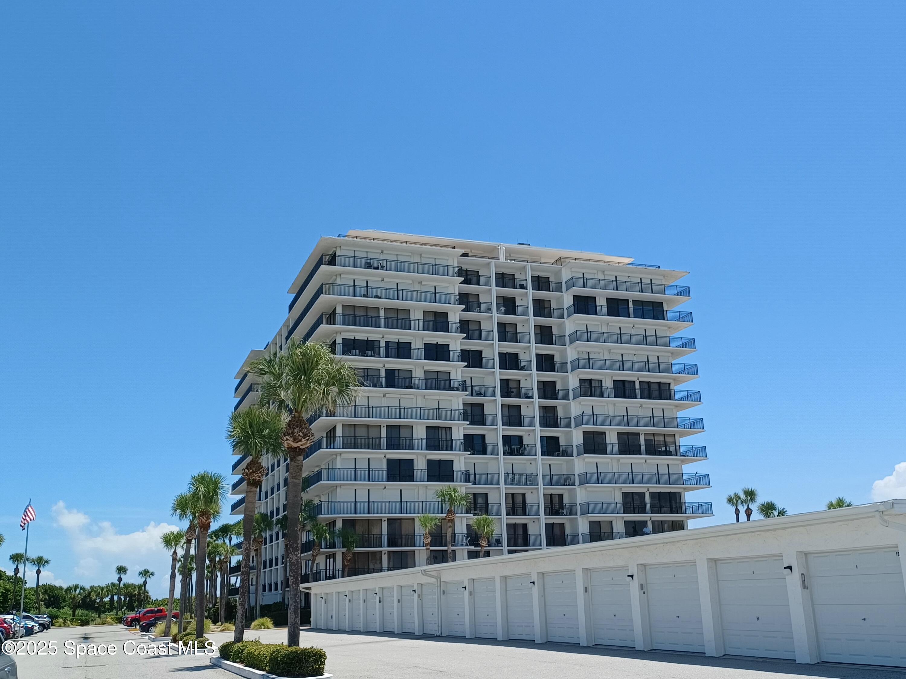 2100 North Atlantic Avenue, Unit 901 Cocoa Beach, FL 32931 - Photo 2 of 54 a view of a building with a street