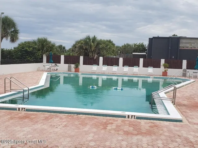 a view of a yard and entertaining space