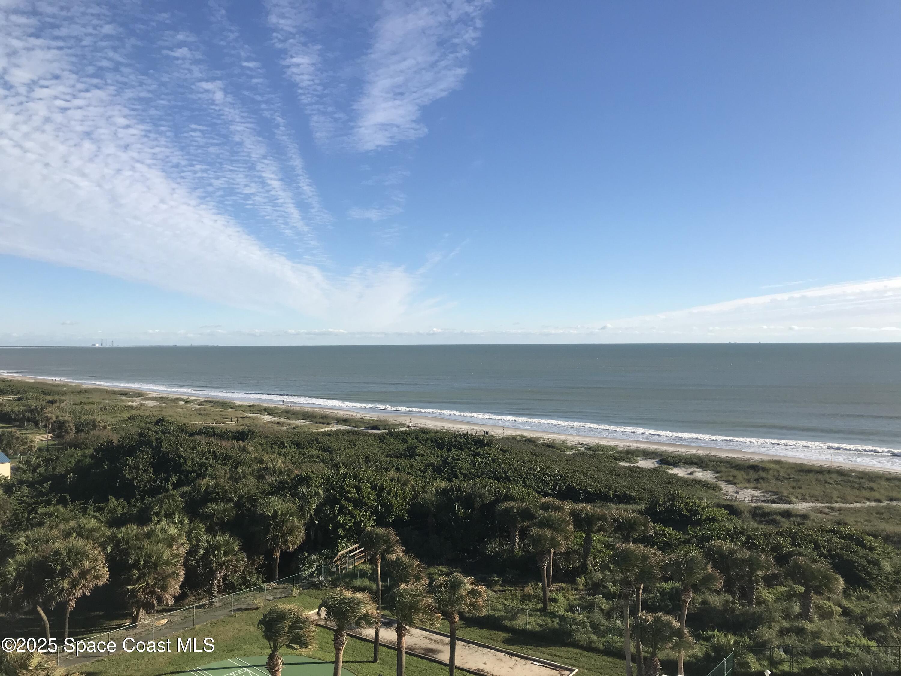 2100 North Atlantic Avenue, Unit 901 Cocoa Beach, FL 32931 - Photo 3 of 54 a view of an ocean and beach
