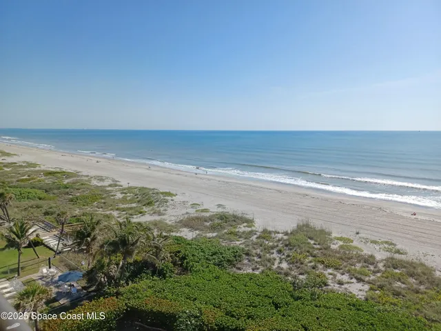 a front view of a building with garden