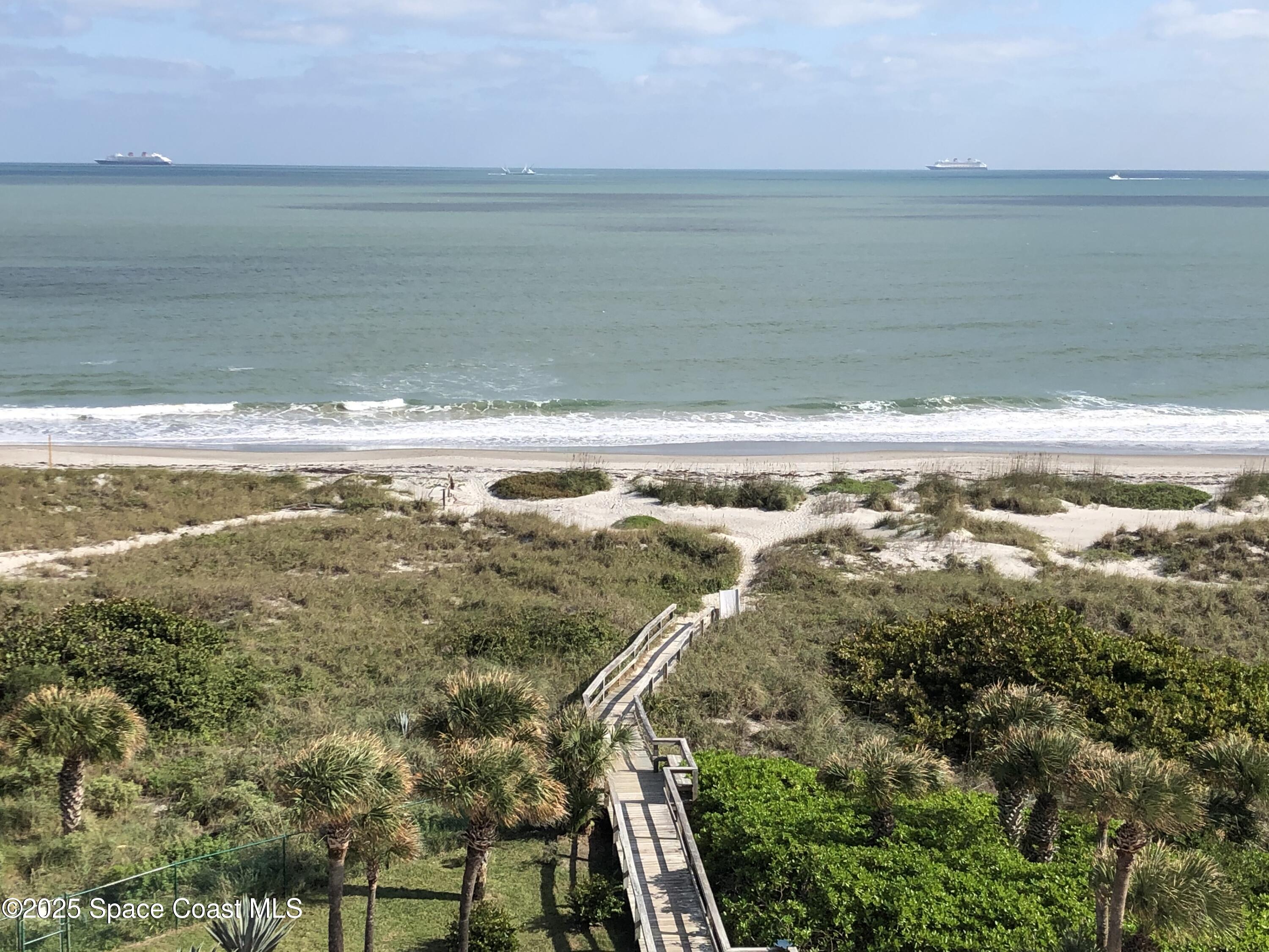 2100 North Atlantic Avenue, Unit 901 Cocoa Beach, FL 32931 - Photo 48 of 54 a view of an ocean and beach