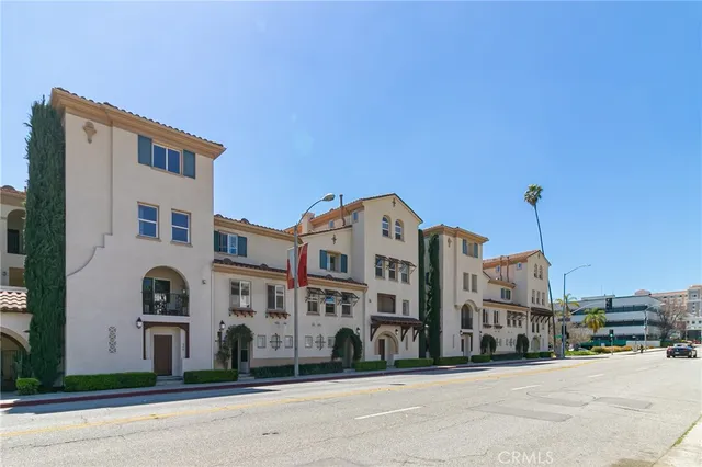 a front view of a building with a street