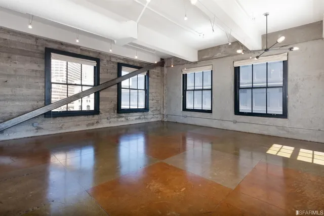 an empty room with windows