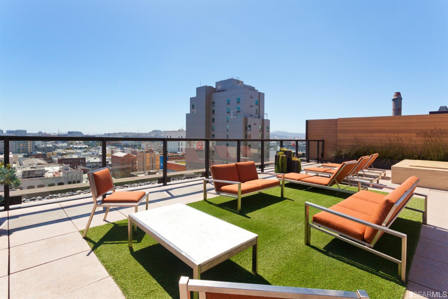 2 Mint Plaza, Unit 801 San Francisco, CA 94103 - Photo 17 of 28 a roof deck with a table and chairs