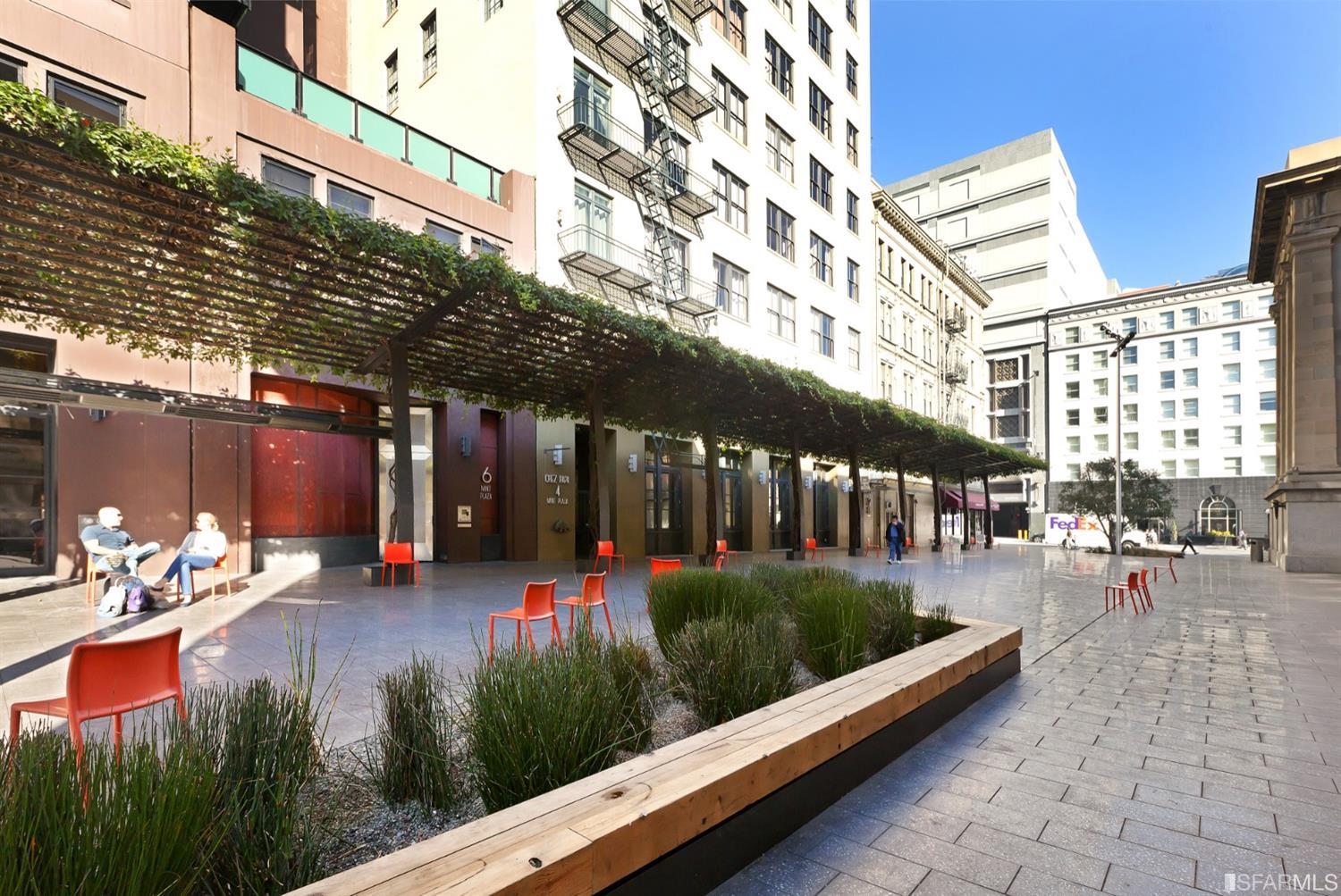 2 Mint Plaza, Unit 801 San Francisco, CA 94103 - Photo 23 of 28 a view of a patio with table and chairs and potted plants