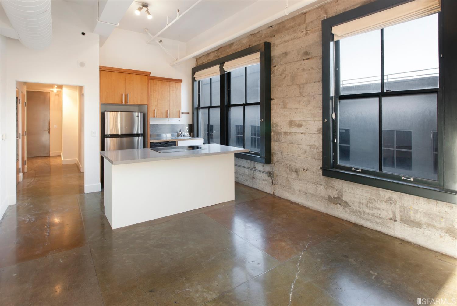 2 Mint Plaza, Unit 801 San Francisco, CA 94103 - Photo 6 of 28 a kitchen with stainless steel appliances granite countertop a refrigerator a stove a sink and a cabinets