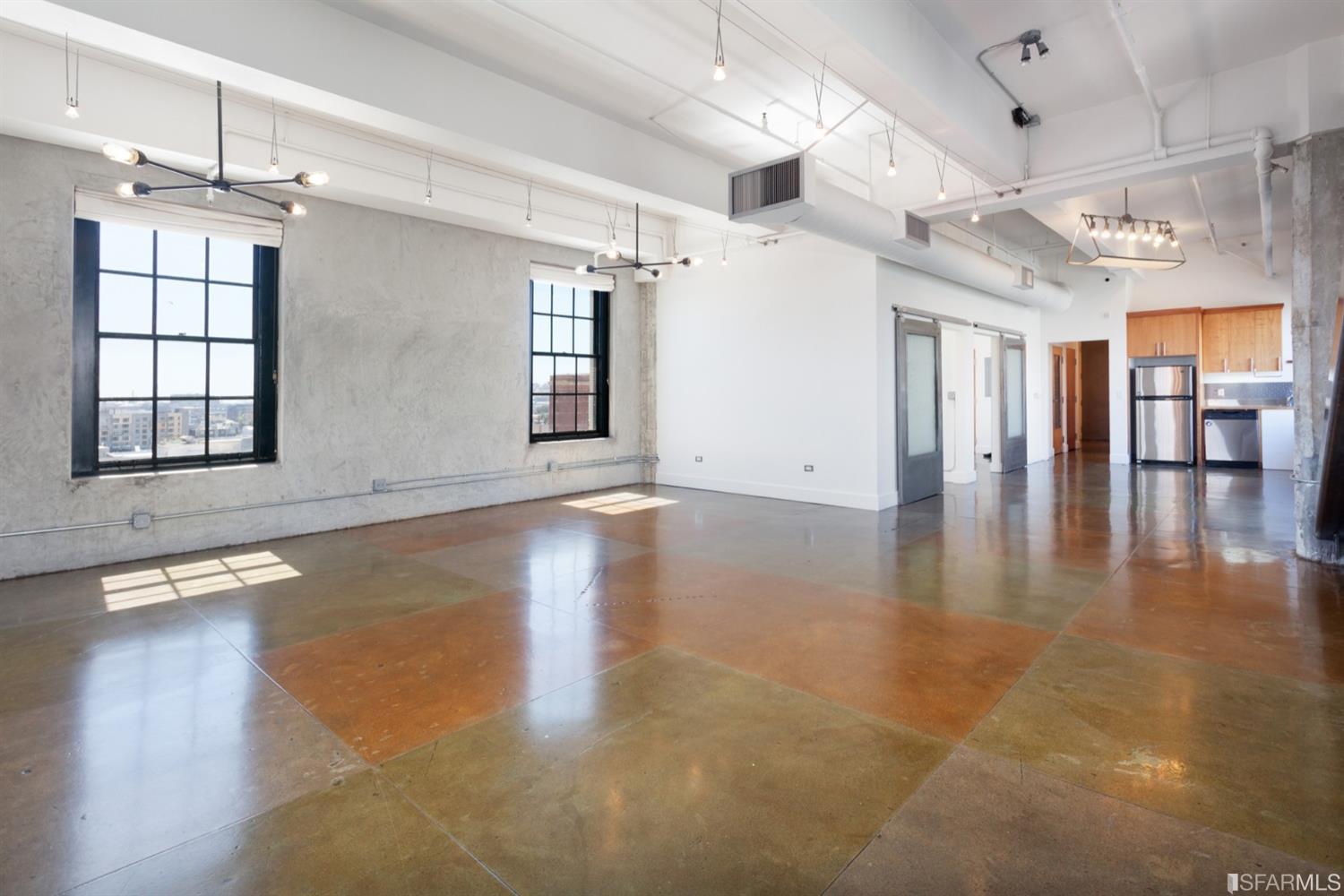 2 Mint Plaza, Unit 801 San Francisco, CA 94103 - Photo 10 of 28 a view of an empty room with wooden floor and a window
