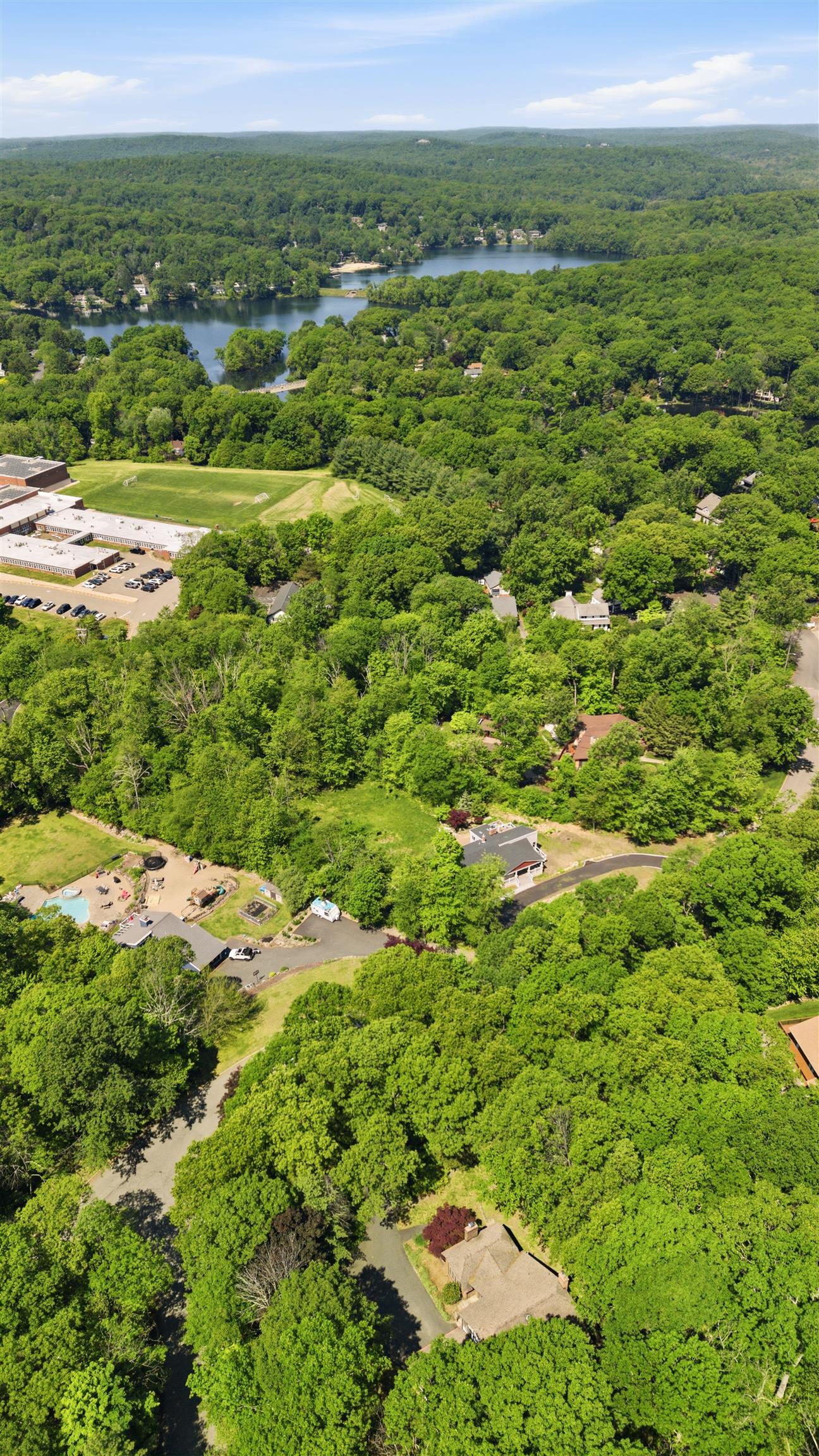 2 Carol Road Butler, NJ 07405 - Photo 43 of 49 a view of a big yard with lots of green space