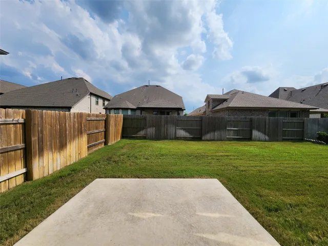 a house view with a garden space