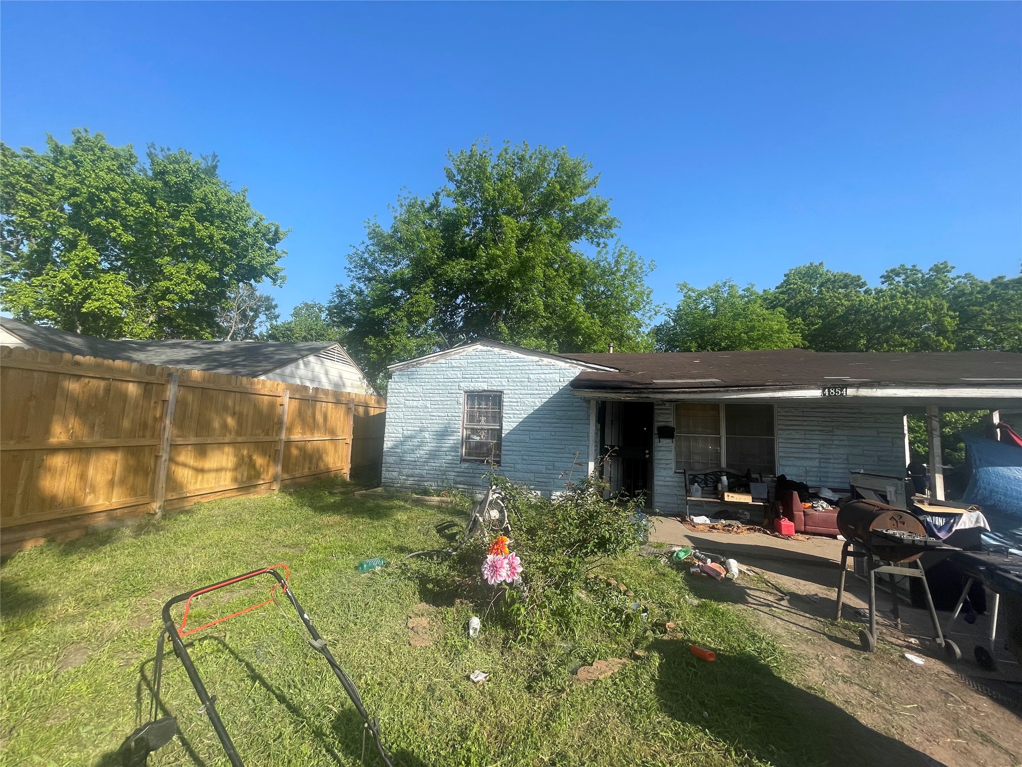 4854 Clover Street Houston, TX 77033 - Photo 2 of 8 a view of a house with backyard tub and sitting area