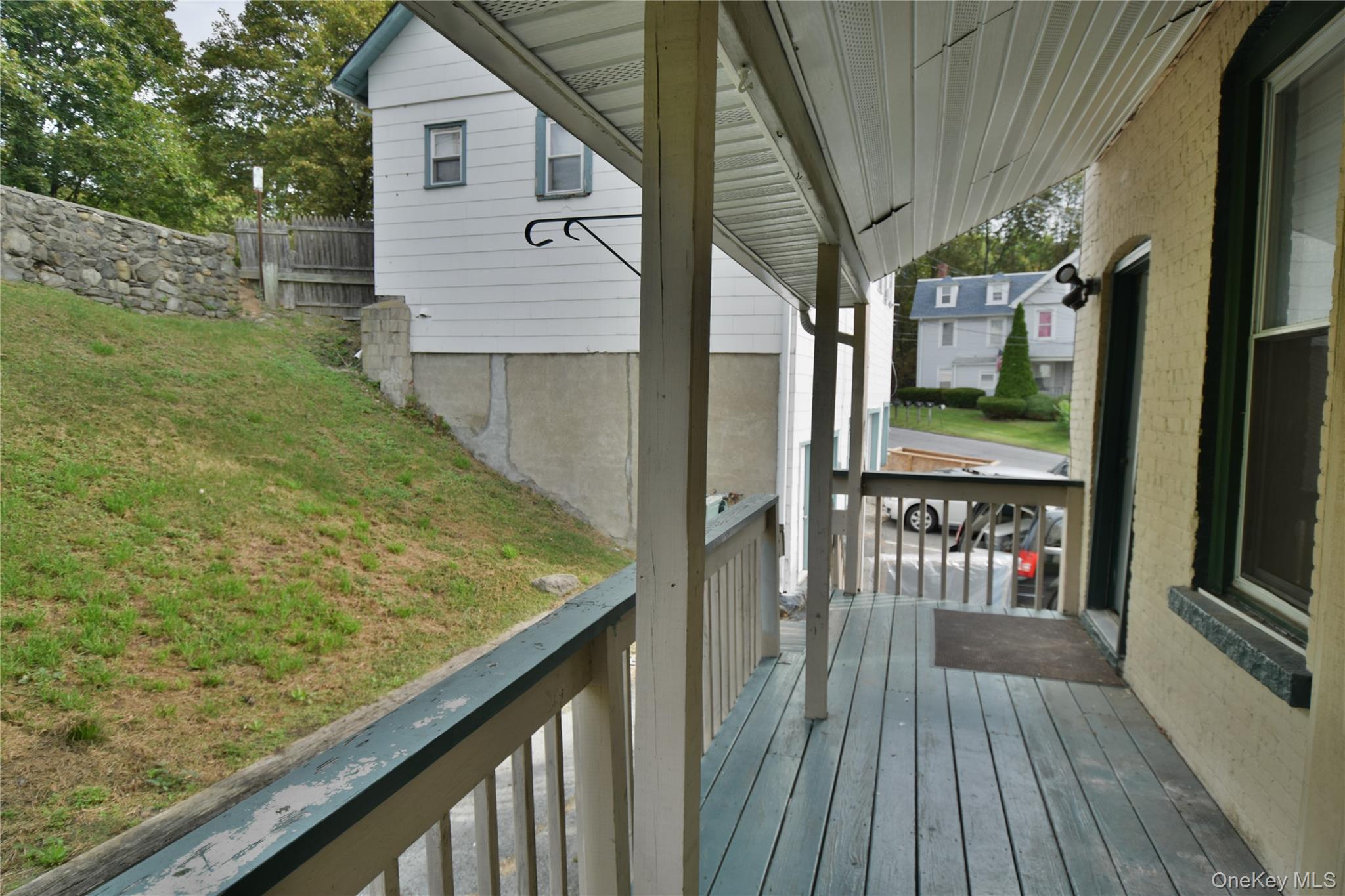 12 Railroad Avenue, Unit 2 Chester, NY 10918 - Photo 11 of 12 a view of a balcony with chairs