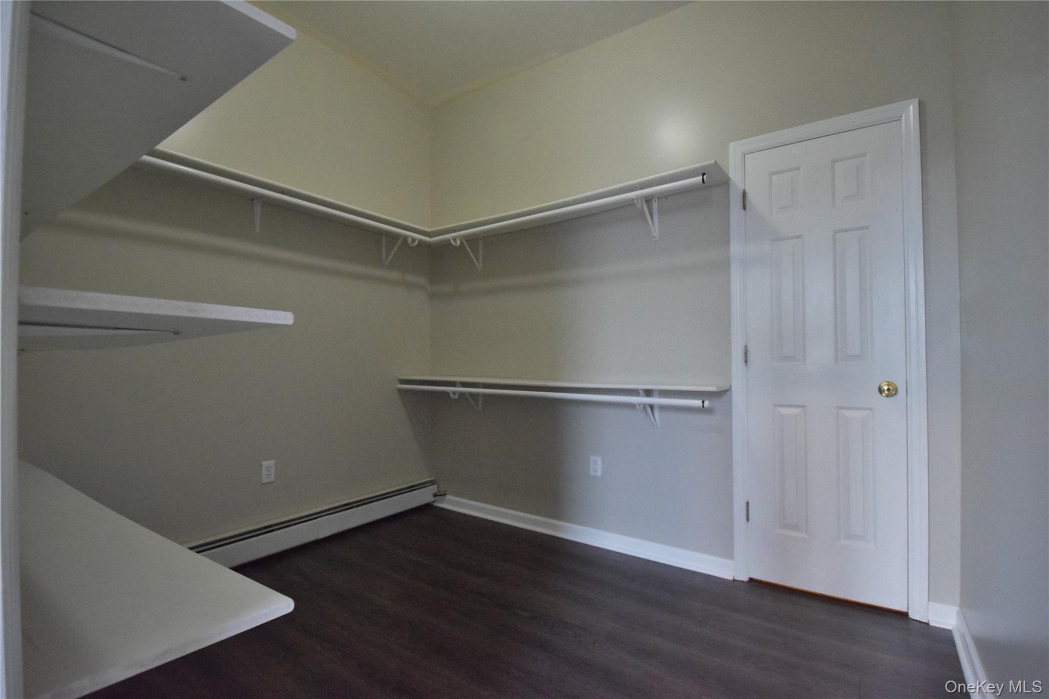12 Railroad Avenue, Unit 2 Chester, NY 10918 - Photo 6 of 12 a view of an empty room with wooden floor