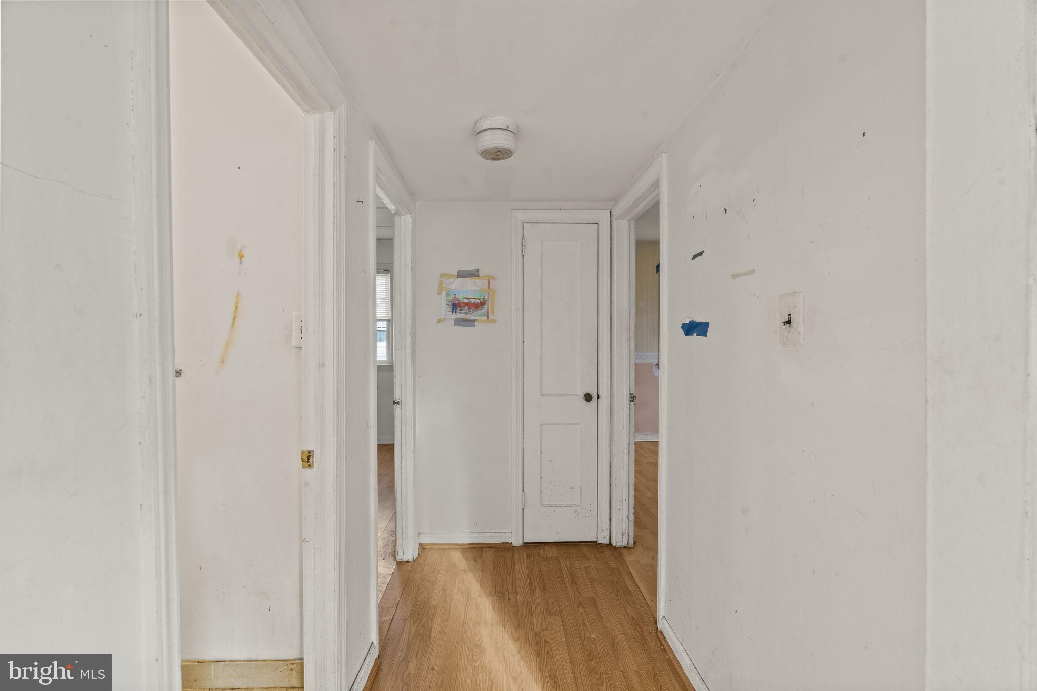 432 North Coles Avenue Maple Shade, NJ 08052 - Photo 11 of 27 a view of a hallway with wooden floor