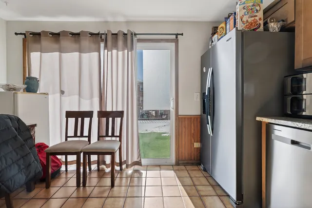 a view of a livingroom with furniture and front door