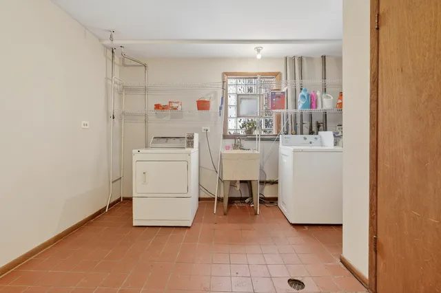 a storage room with washer and dryer