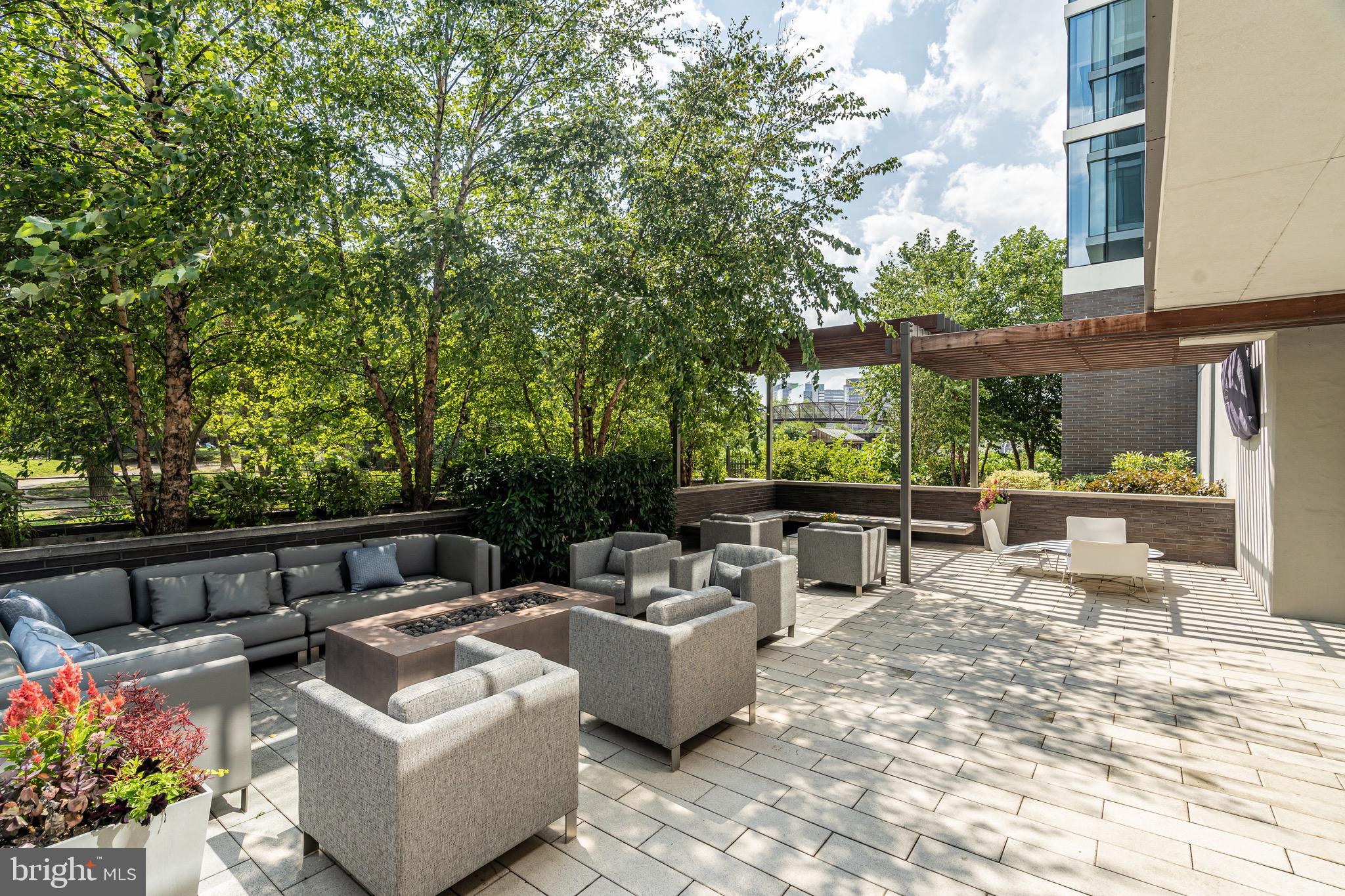 210 South 25th Street, Unit 905 Philadelphia, PA 19103 - Photo 20 of 28 a view of a patio with couches and chairs
