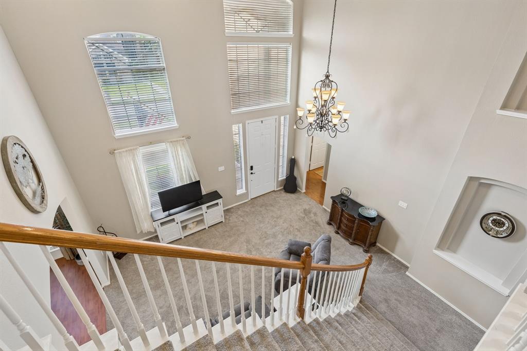 129 Timberbluff Lane Murphy, TX 75094 - Photo 32 of 34 a living room with furniture and a window