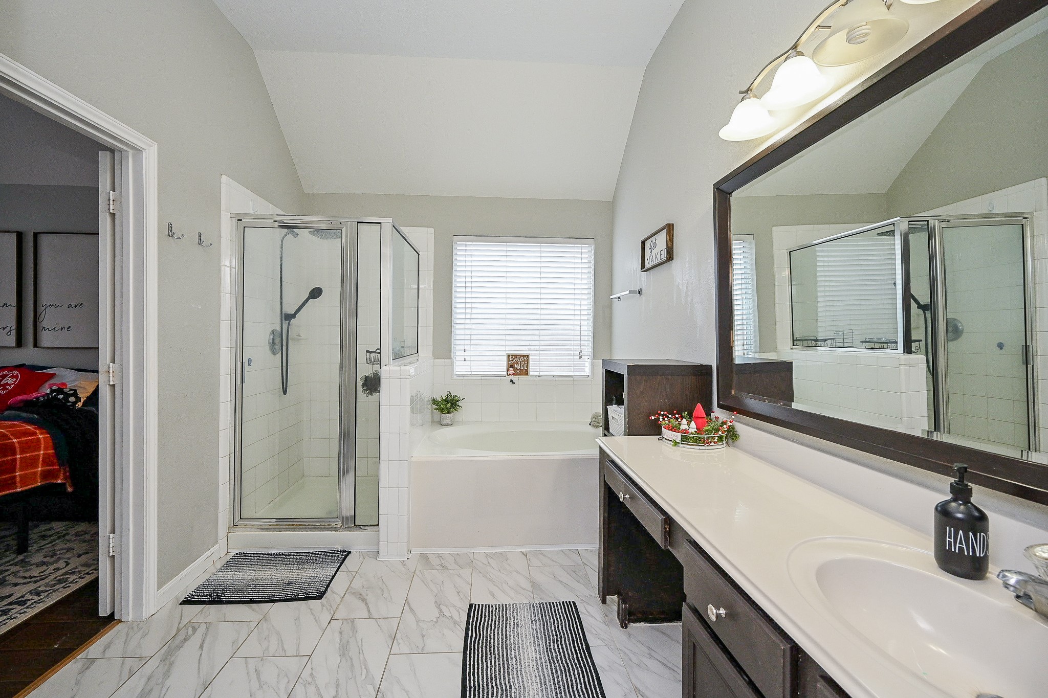 3907 Tigris Ridge Drive Katy, TX 77449 - Photo 12 of 20 a bathroom with a sink double vanity and a mirror