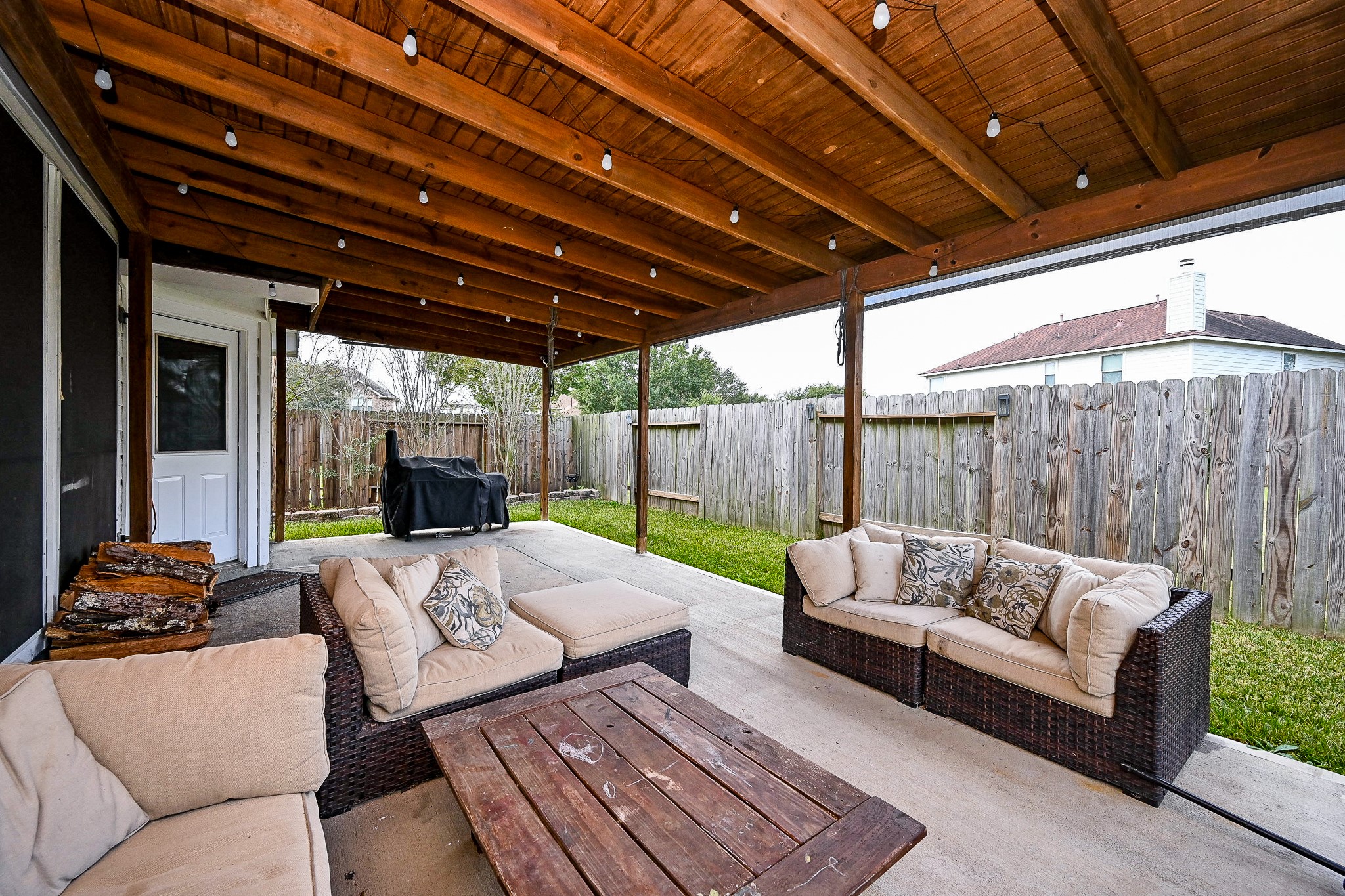 3907 Tigris Ridge Drive Katy, TX 77449 - Photo 18 of 20 a outdoor living space with patio furniture and a couch
