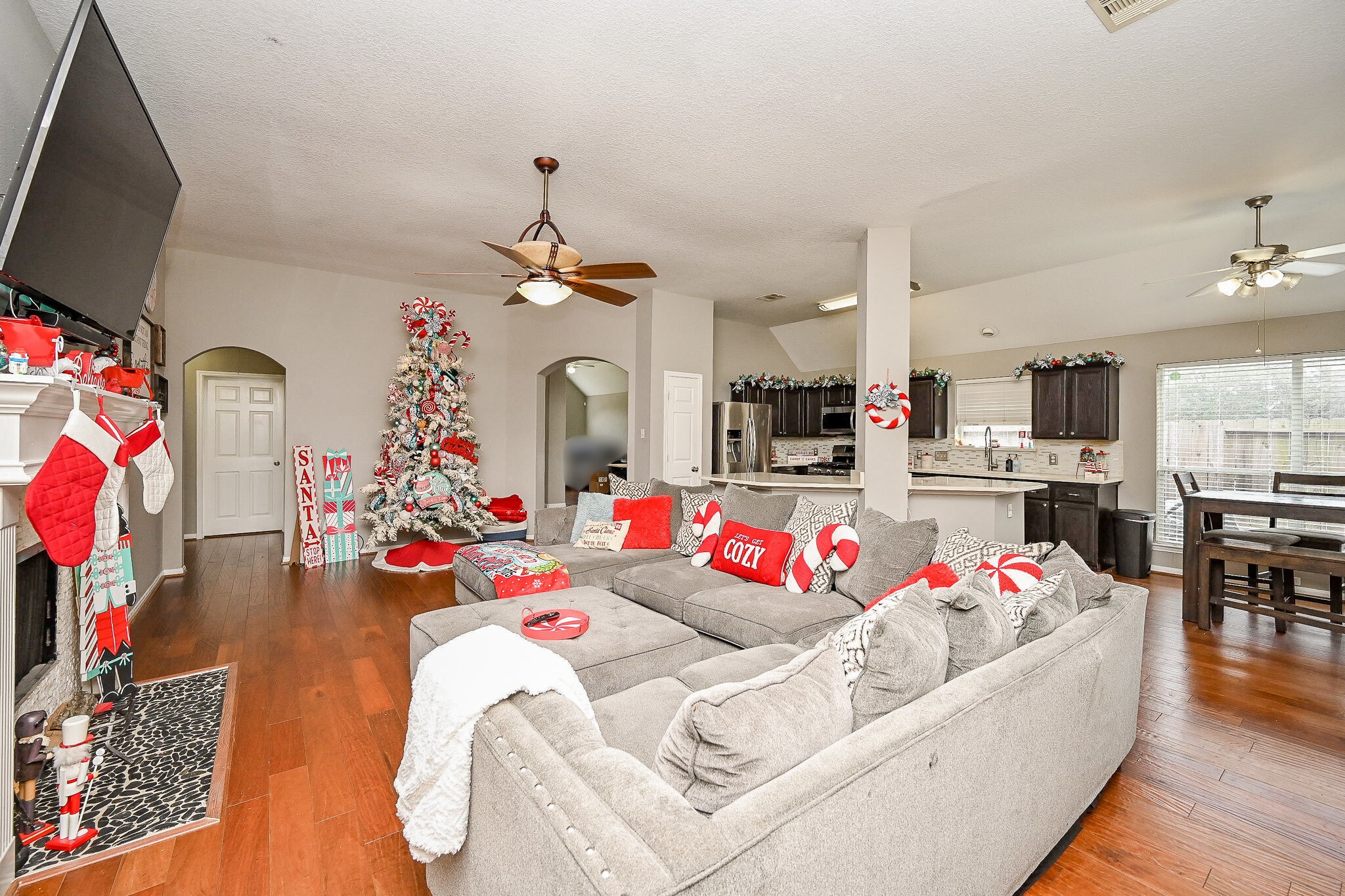 3907 Tigris Ridge Drive Katy, TX 77449 - Photo 5 of 20 a living room with lots of furniture and kitchen view