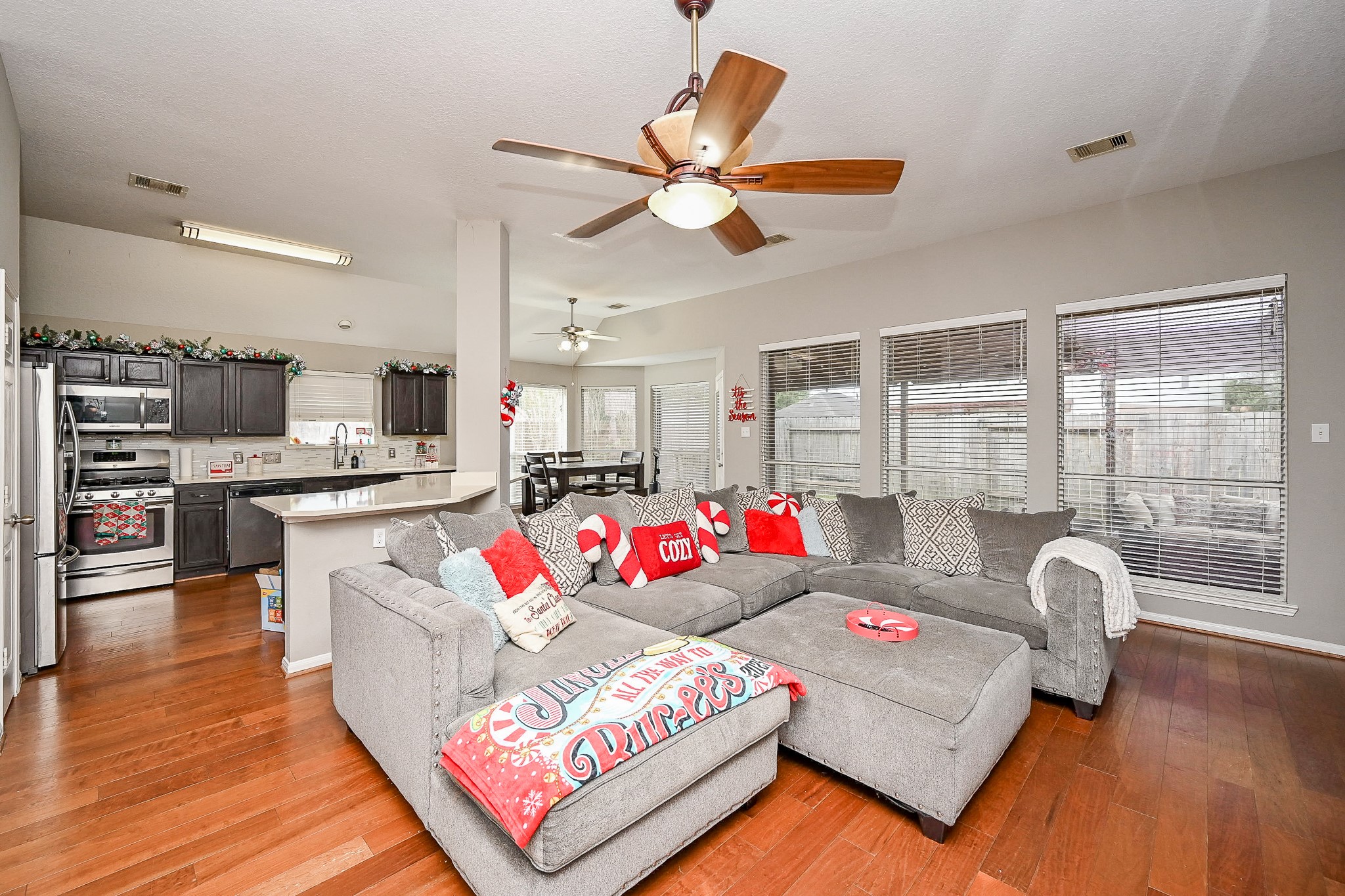3907 Tigris Ridge Drive Katy, TX 77449 - Photo 6 of 20 a living room with furniture kitchen view and a large window