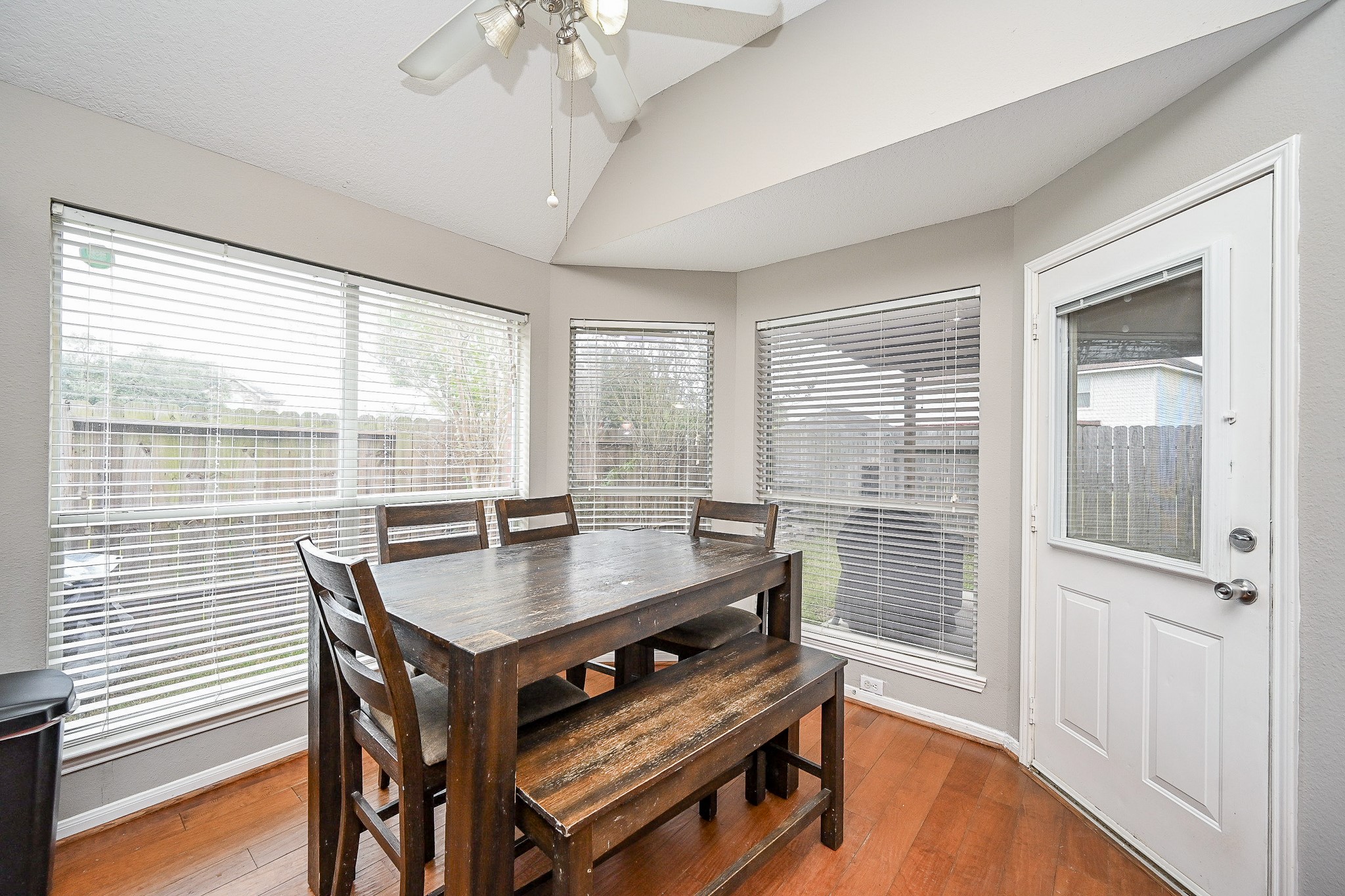 3907 Tigris Ridge Drive Katy, TX 77449 - Photo 10 of 20 a view of a dining room with furniture window and wooden floor