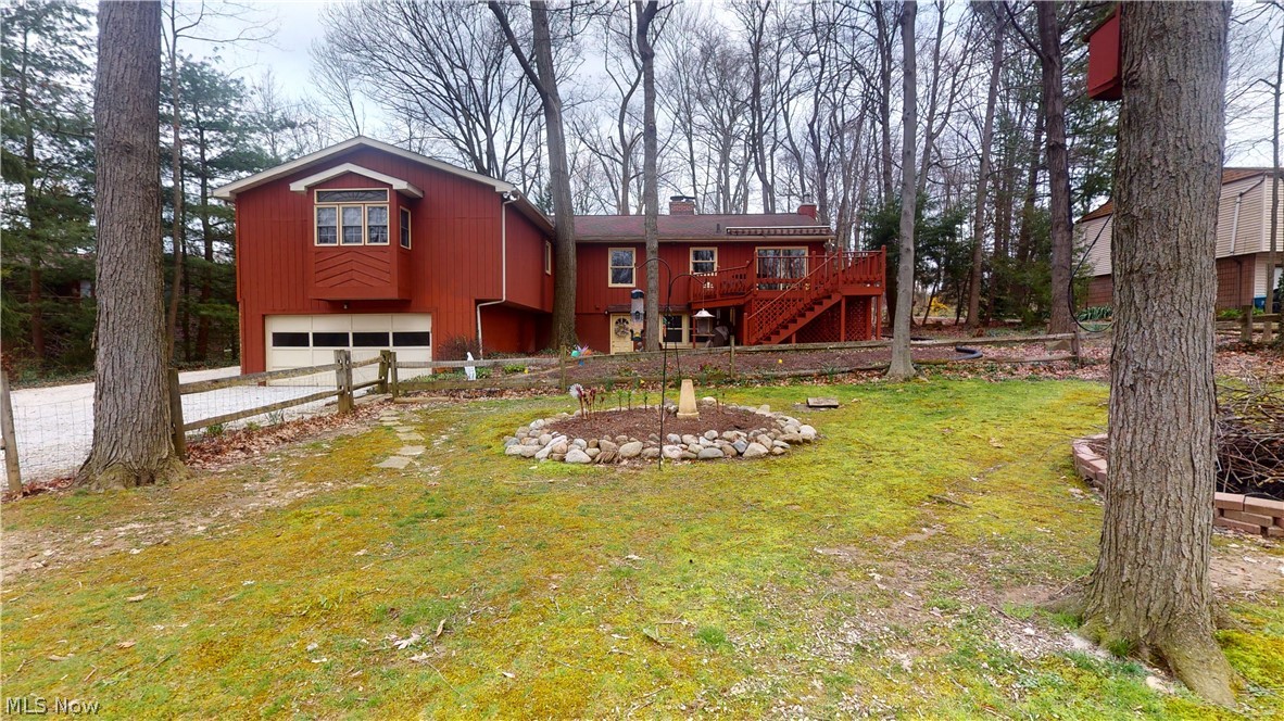 4466 Ridgewood Road Akron, OH 44321 - Photo 2 of 24 Back of house - Walk out basement; 2 car garage; 1.3 acre treed lot.