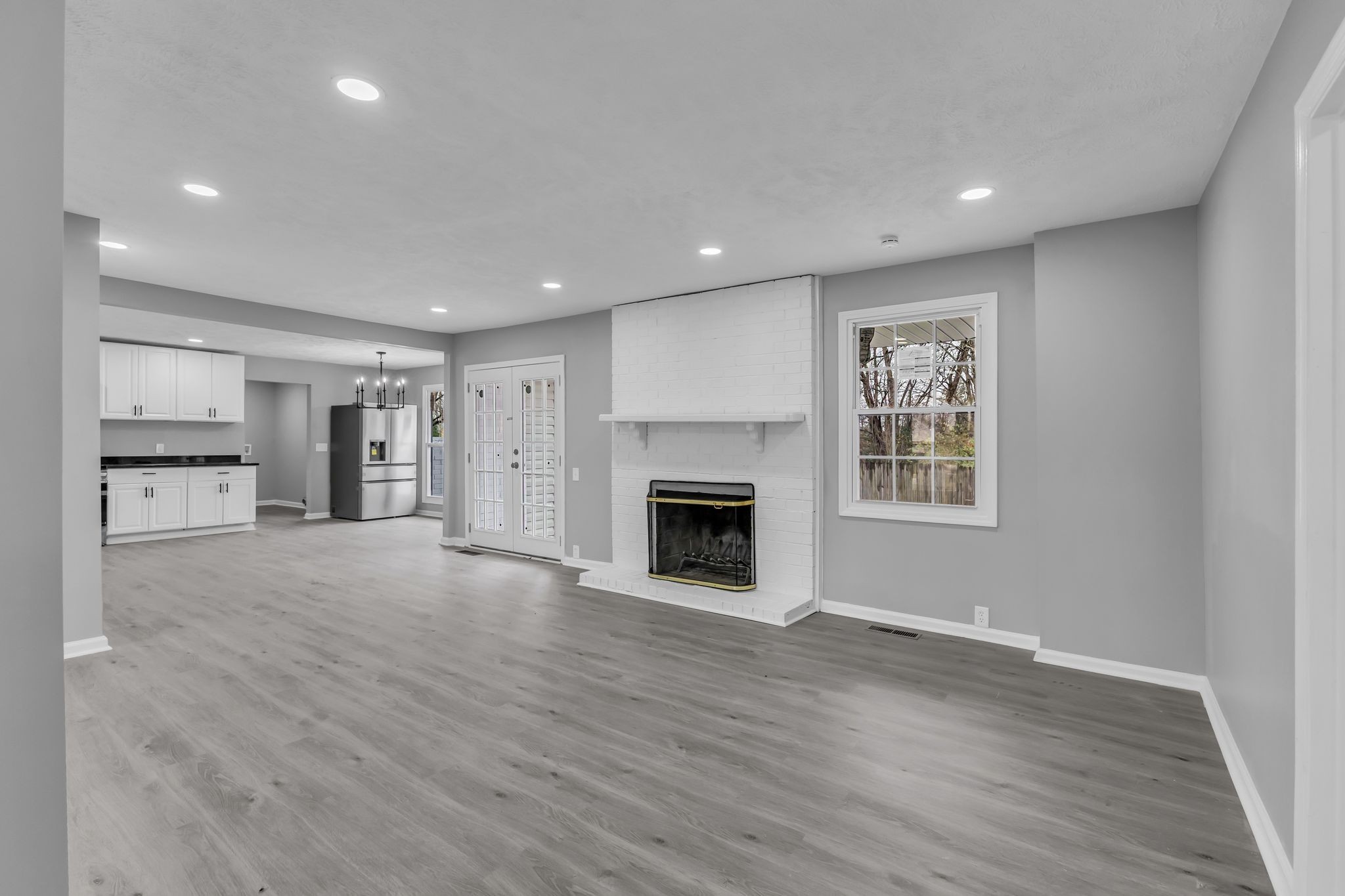 200 Upwind Court Nashville, TN 37217 - Photo 15 of 49 a view of an empty room with a fireplace and a window