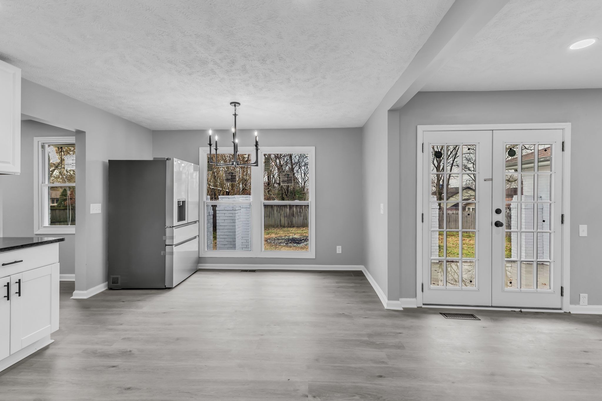 200 Upwind Court Nashville, TN 37217 - Photo 16 of 49 wooden floor in an empty room with a window