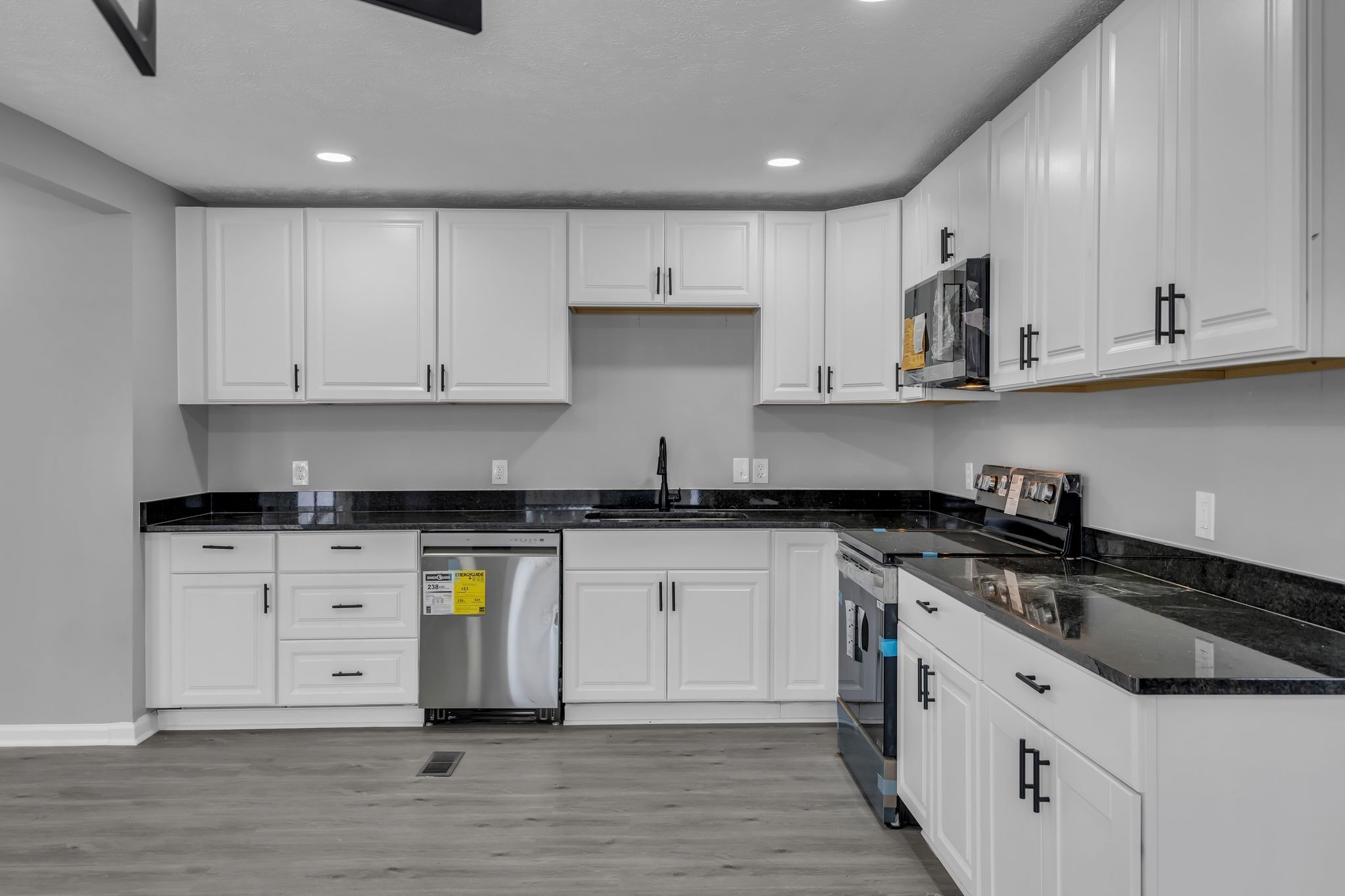 200 Upwind Court Nashville, TN 37217 - Photo 18 of 49 a kitchen with stainless steel appliances granite countertop a sink and cabinets