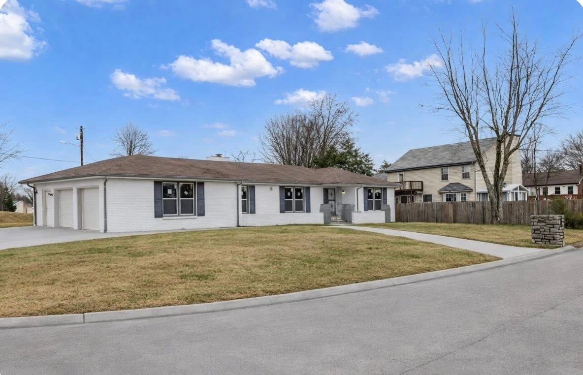 200 Upwind Court Nashville, TN 37217 - Photo 2 of 49 a house that has a tree in front of it