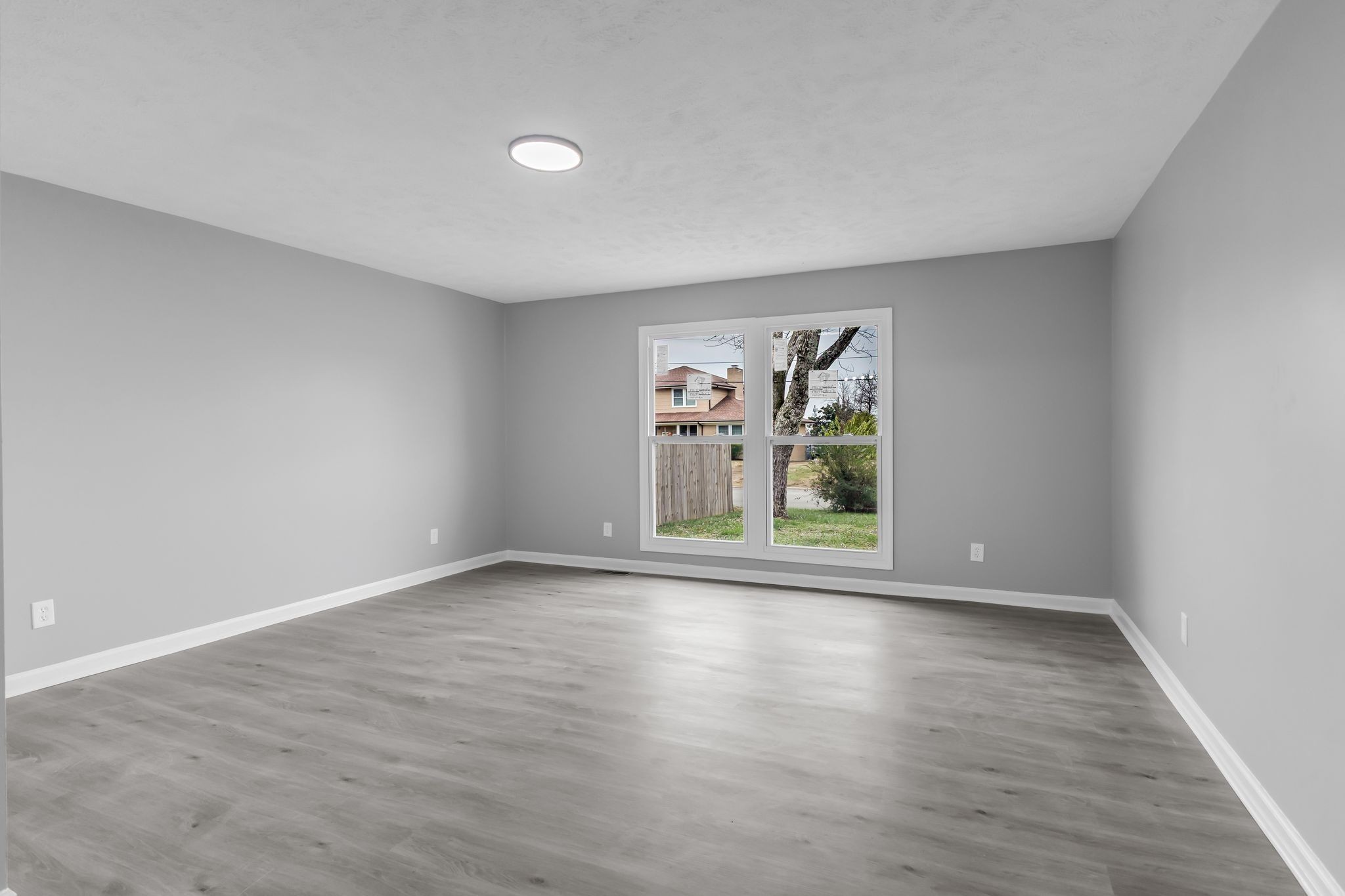 200 Upwind Court Nashville, TN 37217 - Photo 21 of 49 a view of room with window and wooden floor