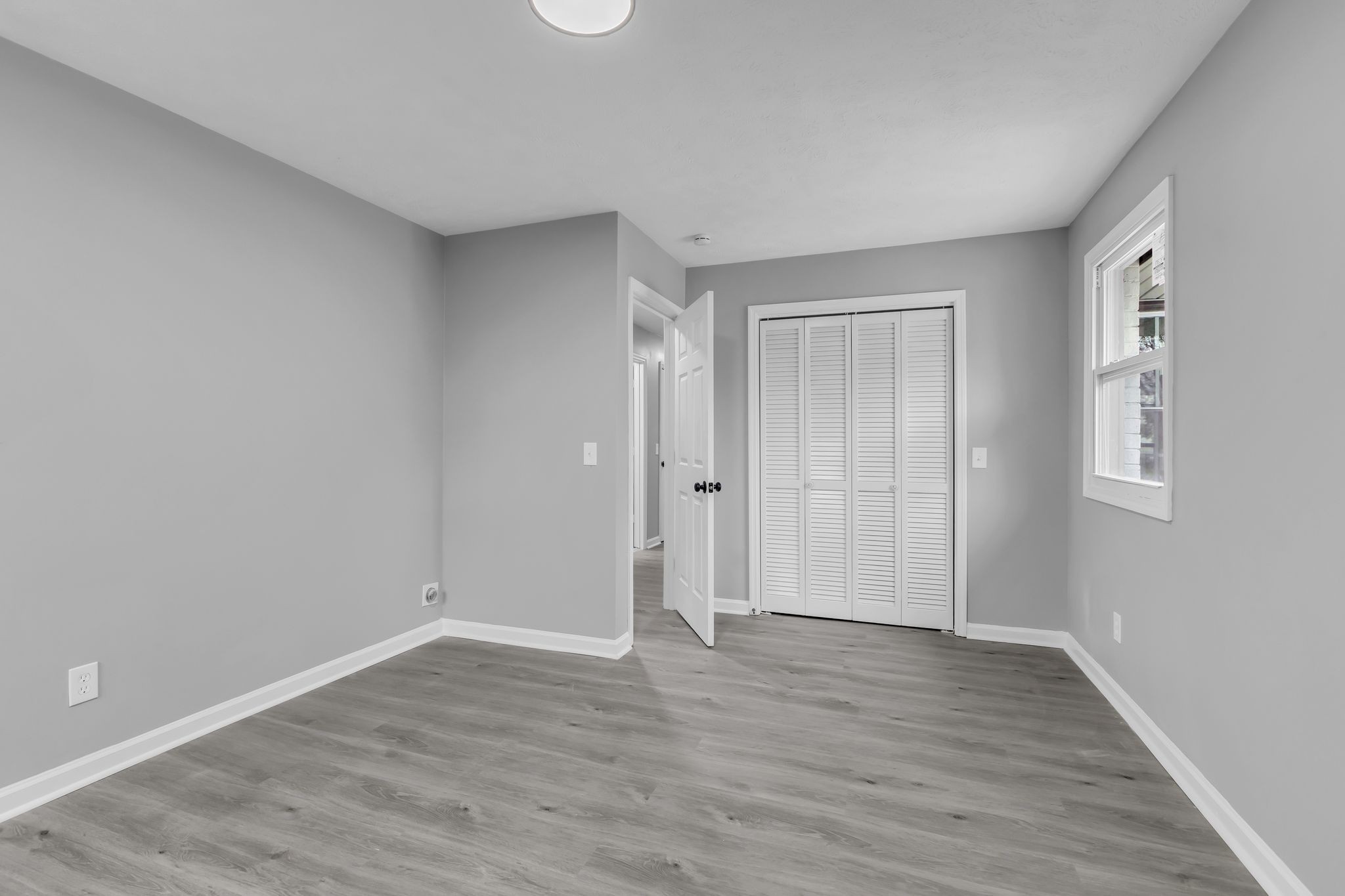 200 Upwind Court Nashville, TN 37217 - Photo 25 of 49 a view of an empty room with wooden floor and window