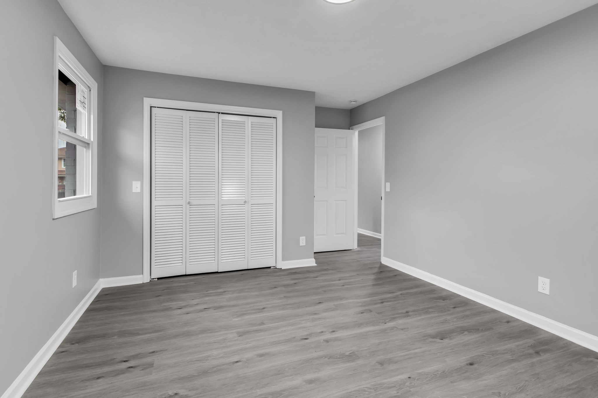 200 Upwind Court Nashville, TN 37217 - Photo 27 of 49 an empty room with wooden floor and windows