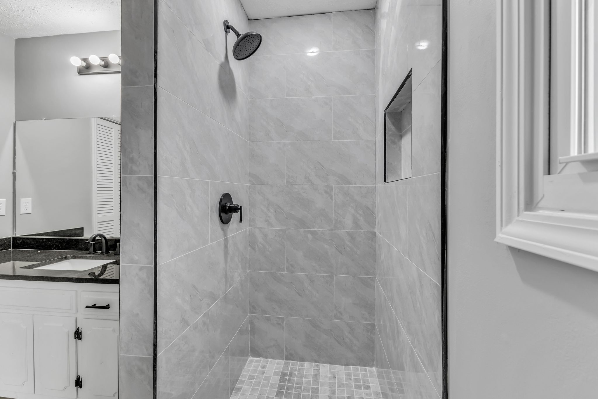 200 Upwind Court Nashville, TN 37217 - Photo 29 of 49 a bathroom with a granite countertop shower