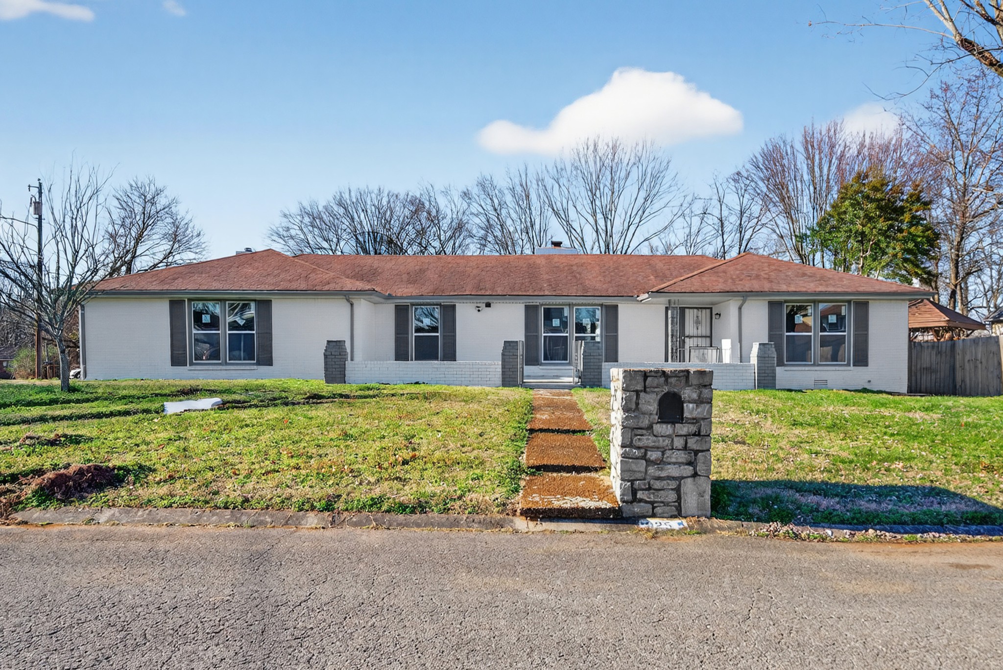 200 Upwind Court Nashville, TN 37217 - Photo 3 of 49 a front view of a house with a garden