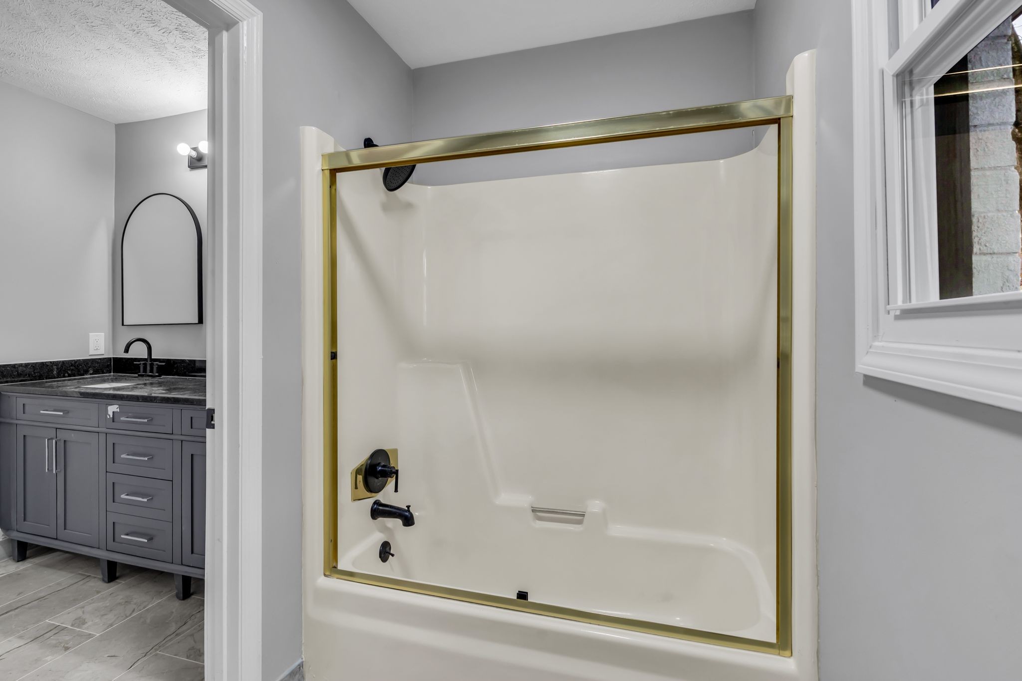 200 Upwind Court Nashville, TN 37217 - Photo 31 of 49 a bathroom with a shower and a sink