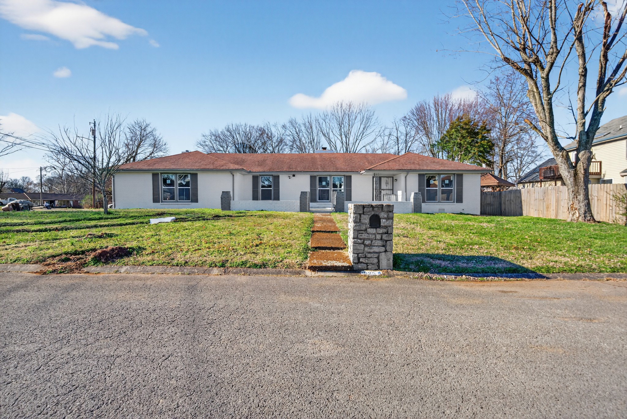 200 Upwind Court Nashville, TN 37217 - Photo 4 of 49 a view of a house with a yard and potted plants