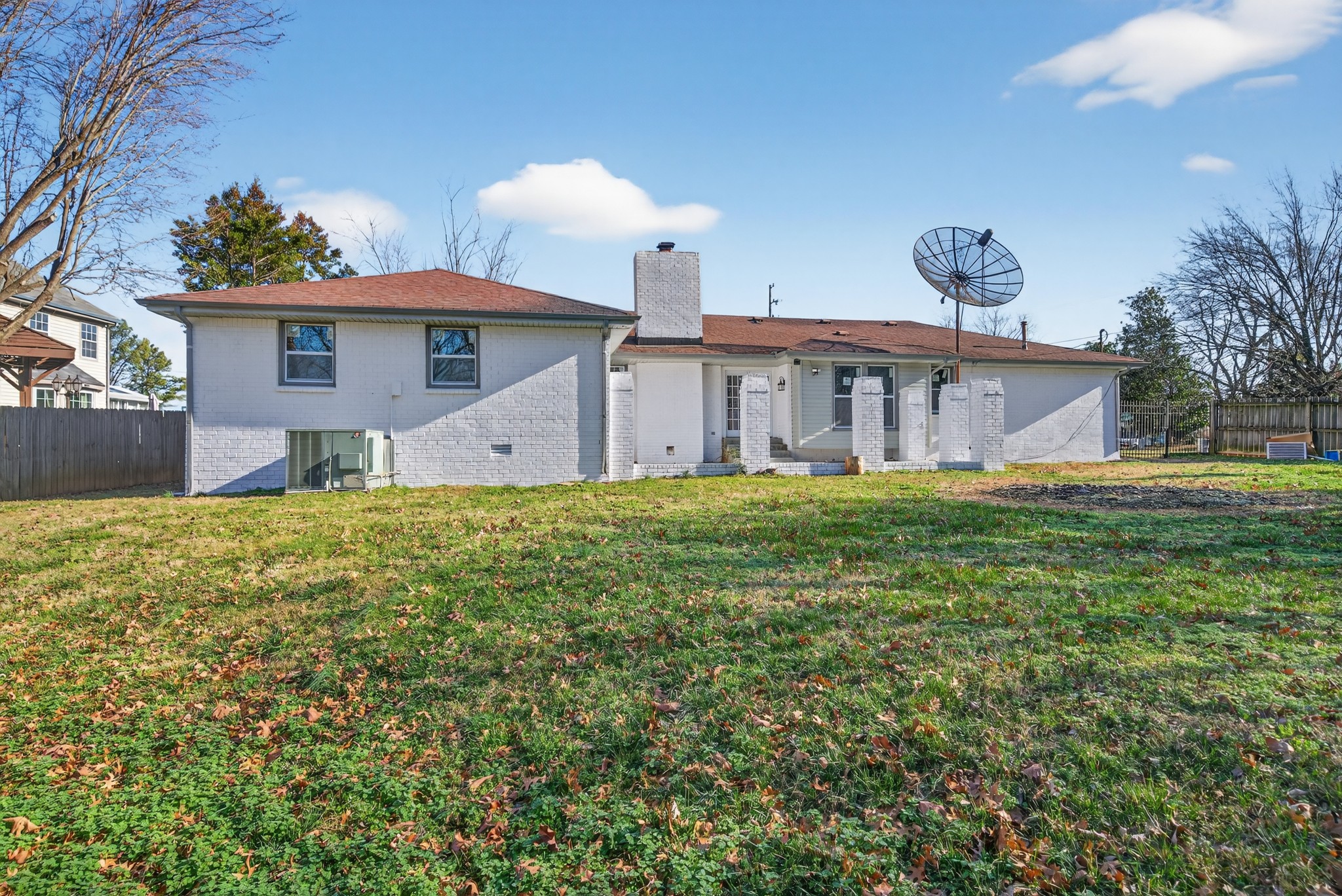 200 Upwind Court Nashville, TN 37217 - Photo 45 of 49 a large tree in front of a house with a yard