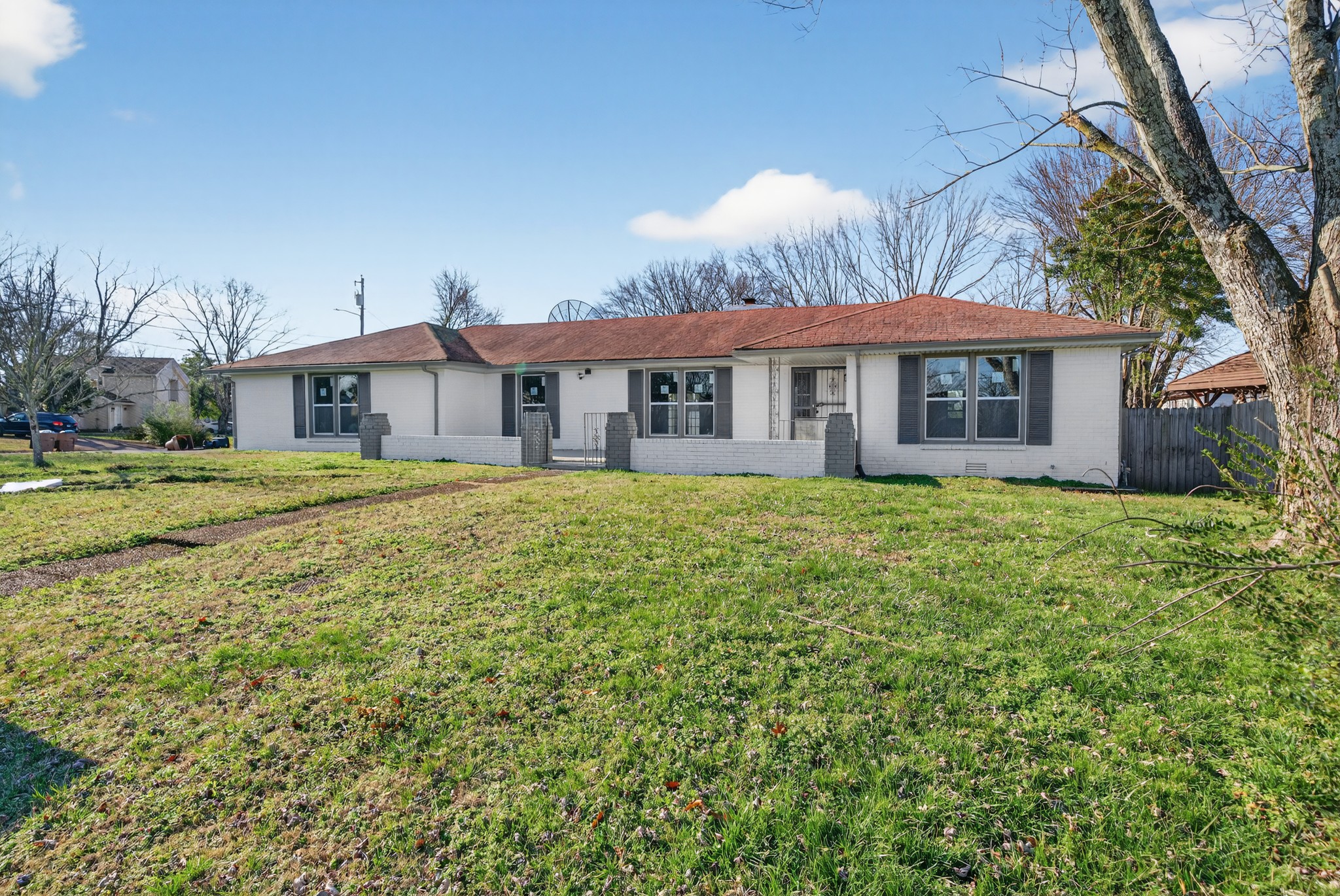 200 Upwind Court Nashville, TN 37217 - Photo 8 of 49 a view of a house with a yard and potted plants
