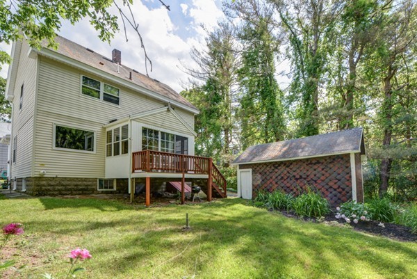 7 Martin Street Maynard, MA 01754 - Photo 24 of 28 a view of a house with a yard and sitting area