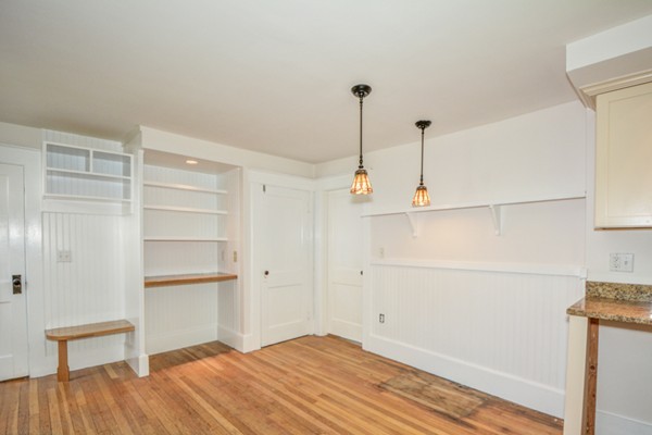 7 Martin Street Maynard, MA 01754 - Photo 8 of 28 a view of empty room with wooden floor