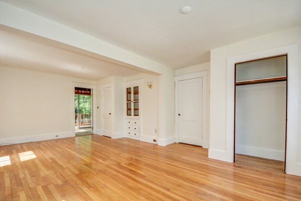 7 Martin Street Maynard, MA 01754 - Photo 10 of 28 a view of empty room with wooden floor