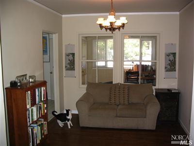 125 Butterfield Road San Anselmo, CA 94960 - Photo 4 of 10 a living room with furniture and a chandelier