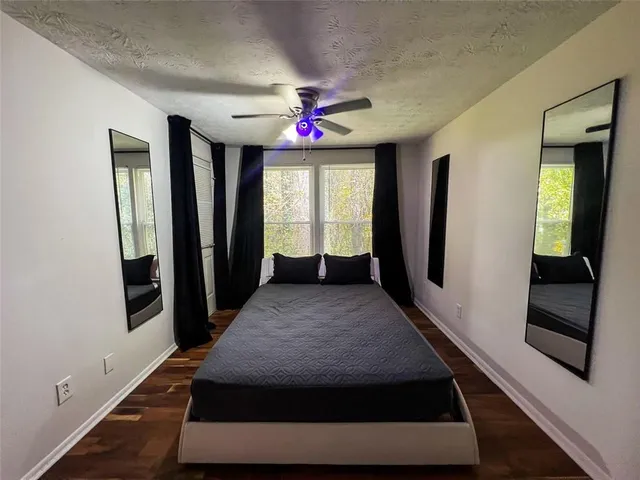 workspace with wooden floor and window