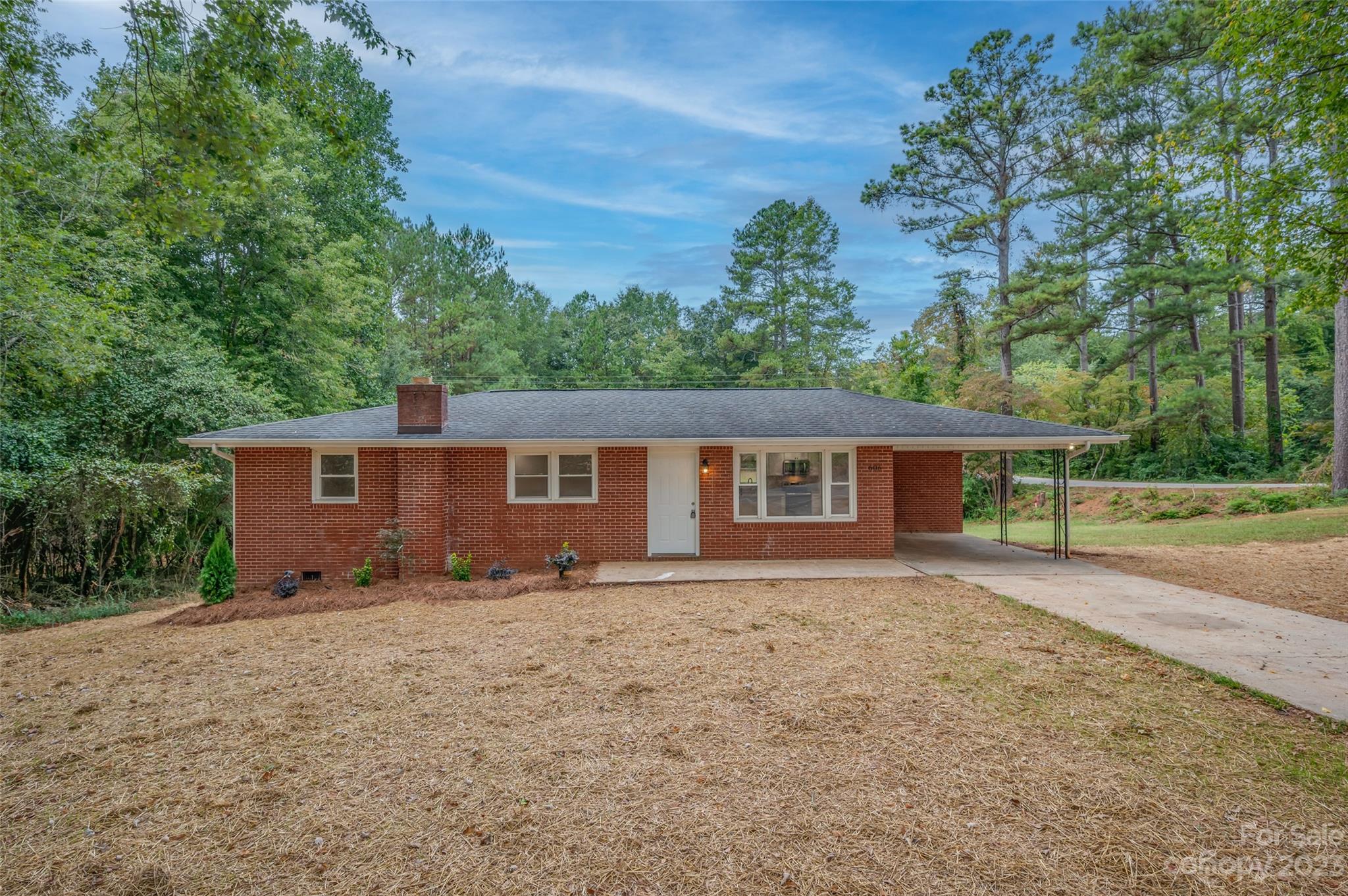 front view of a house with a yard