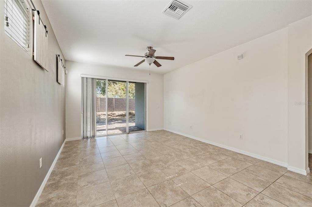 1570 Fox Grape Loop Lutz, FL 33558 - Photo 11 of 41 a view of an empty room with a window
